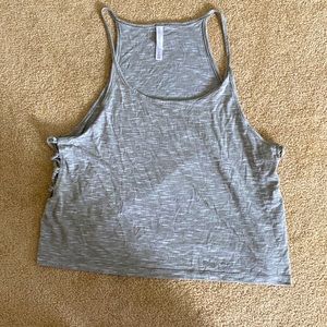 Kids size large LIGHTLY WORN athletic tank top. Could fit a XS-S woman as well!!